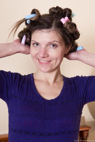 Aga in We Are Hairy set Aga plays and strips naked on her colored bed