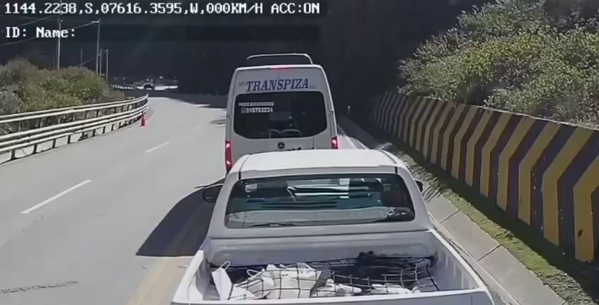 a large boulder fell off a hill on the Central Highway in Peru and landed on a pickup truck